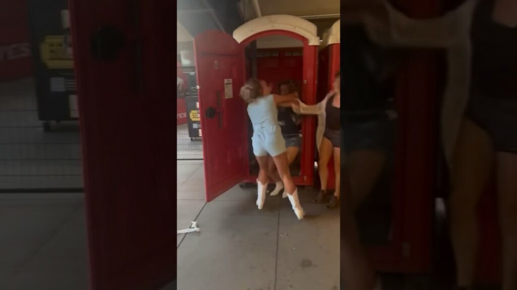 watch porta potty fight video