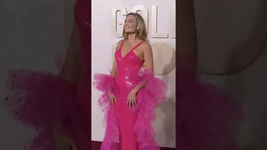 margot robbie gives barbie at go